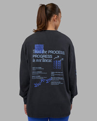 Woman wearing Cali FLXCotton Oversized Long Sleeve Tee - Black Washed | Model:Charlize | Size:XS