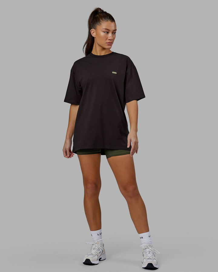 Woman wearing Unisex Capsule FLXCotton Tee Oversize - Dark Walnut