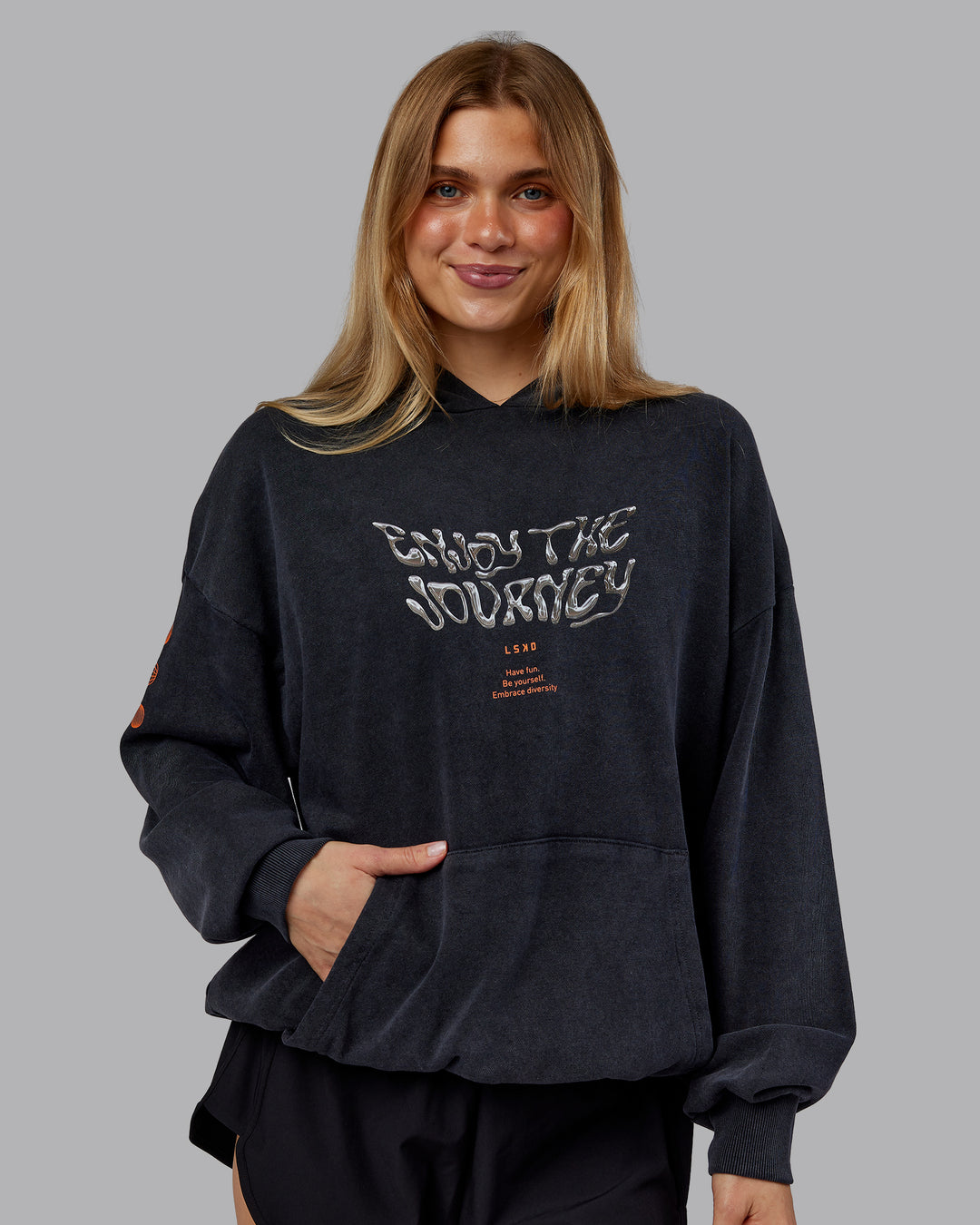 Woman wearing Chrome Washed Oversized Hoodie - Black | Model:Emilie | Size:XS