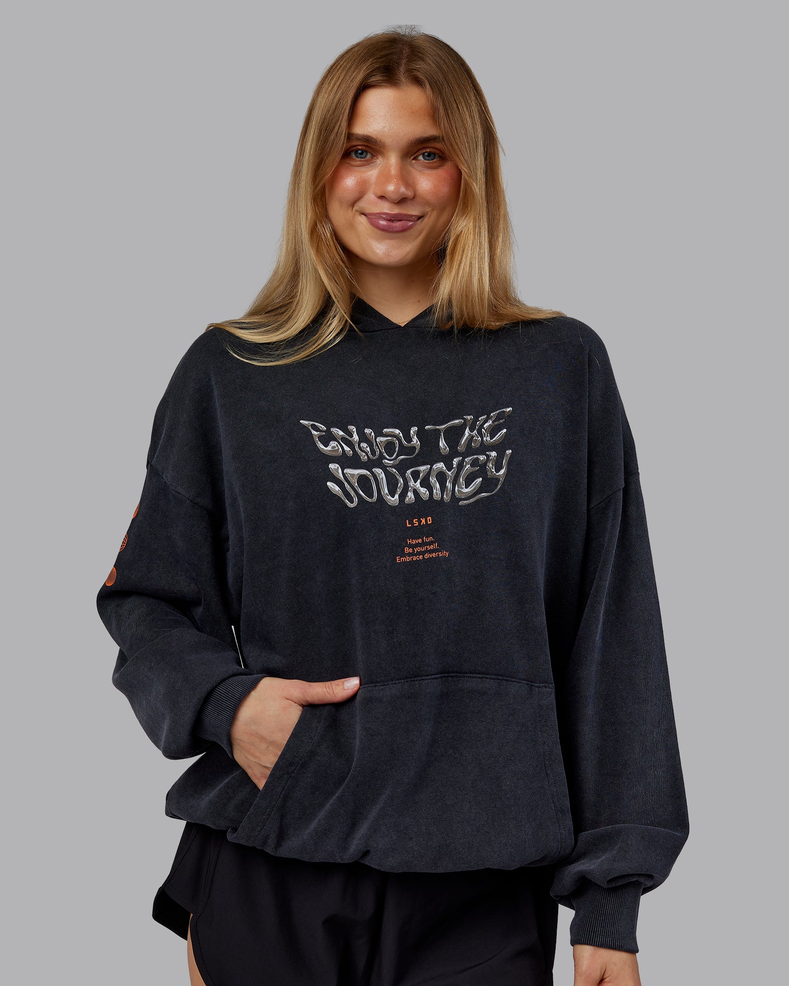 Woman wearing Chrome Washed Oversized Hoodie - Black | Model:Emilie | Size:XS