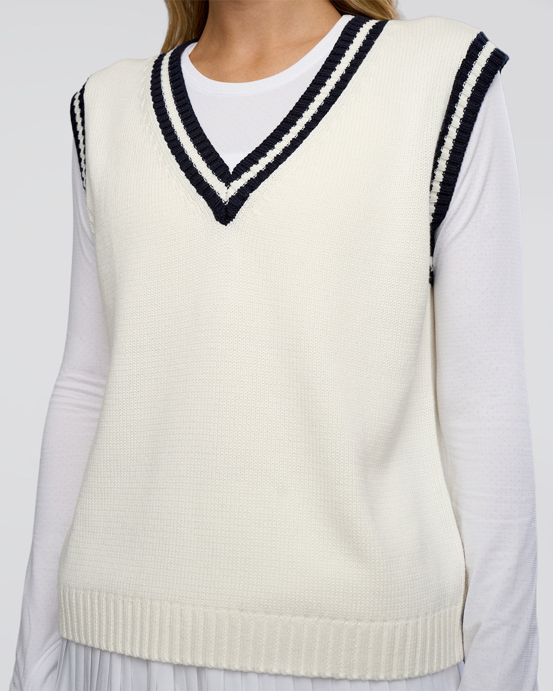 Woman wearing Clubhouse Vest - Off White-Future Navy | Model:Leilani | Size:XS