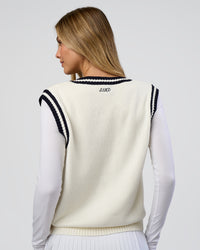 Woman wearing Clubhouse Vest - Off White-Future Navy | Model:Leilani | Size:XS