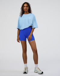 Woman wearing Coffee Run FLXCotton Oversized Tee - Open Air-White | Model:Jordan | Size:L