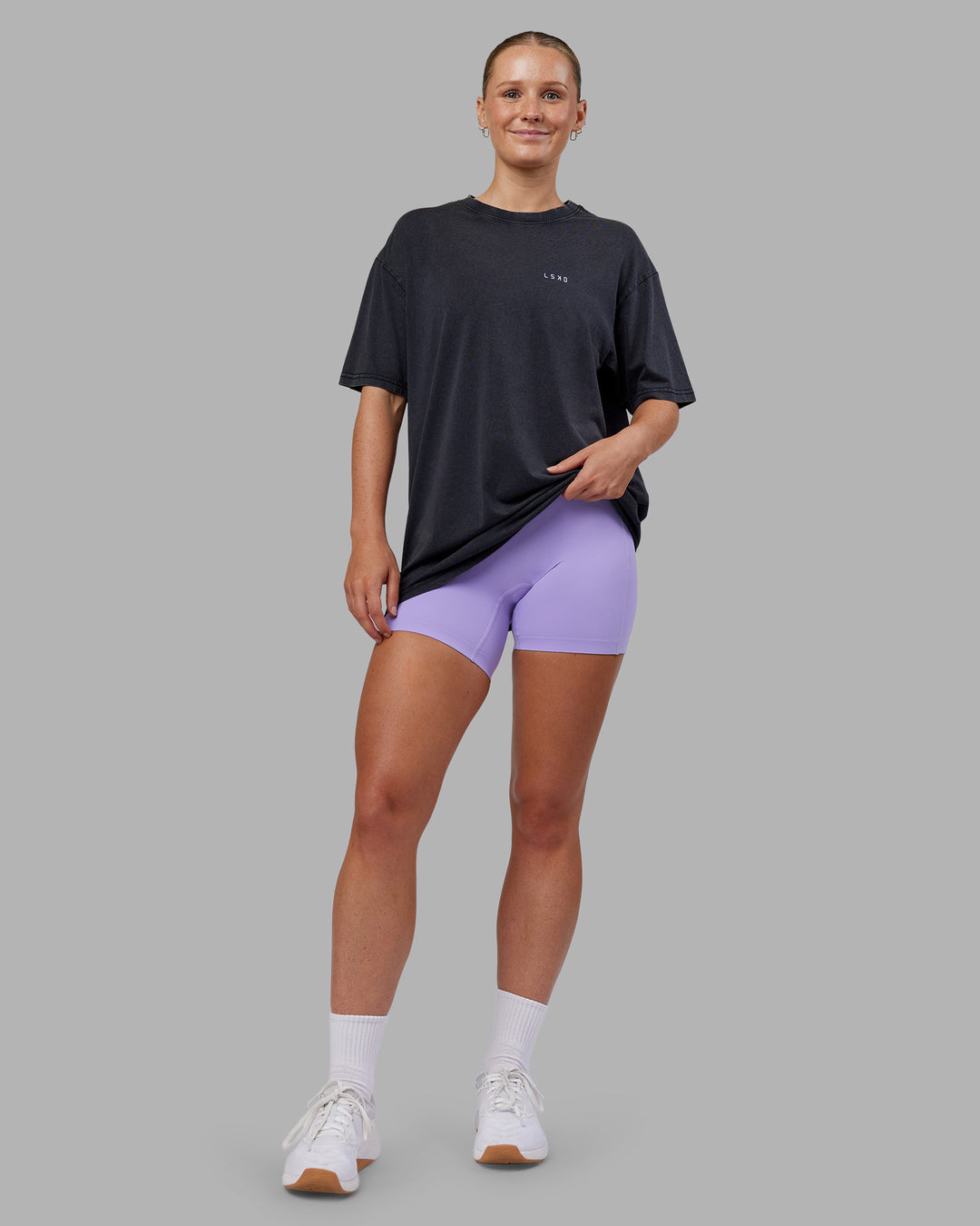 Woman wearing Dare To Think FLXCotton Tee Oversize - Black Washed-Violet Ray | Model:Neve | Size:XS