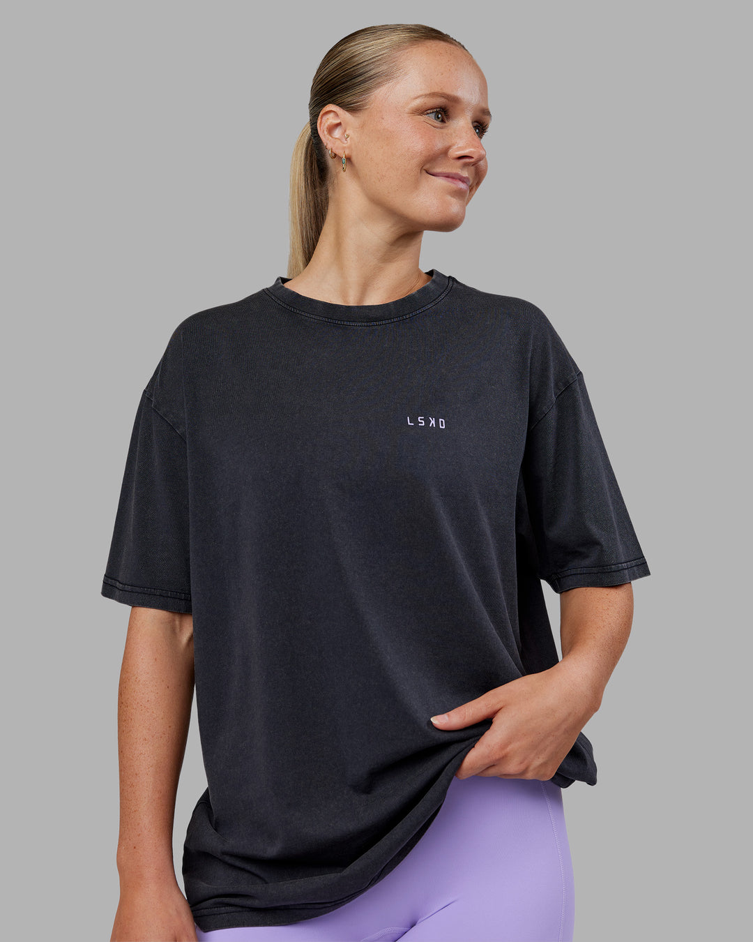 Woman wearing Dare To Think FLXCotton Tee Oversize - Black Washed-Violet Ray | Model:Neve | Size:XS