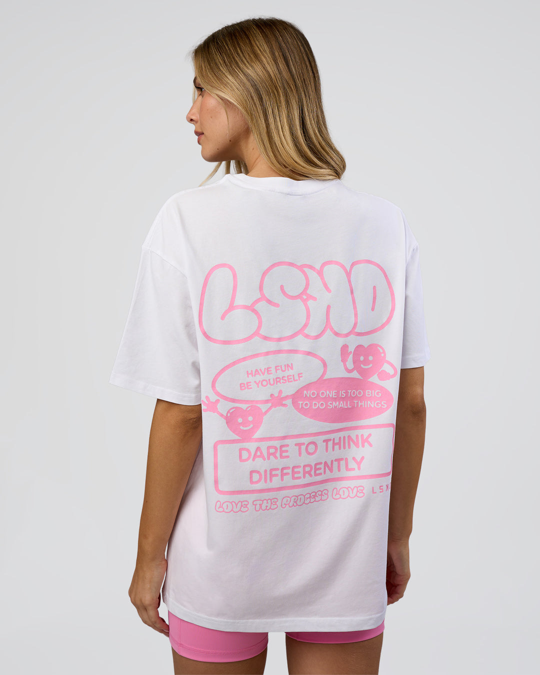 Woman wearing Dare To Think FLXCotton Tee Oversize - White-Candy Pink | Model:Leilani | Size:XS