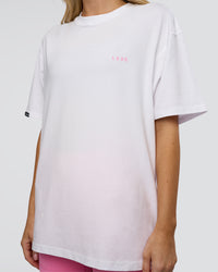 Woman wearing Dare To Think FLXCotton Tee Oversize - White-Candy Pink | Model:Leilani | Size:XS