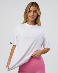 Woman wearing Dare To Think FLXCotton Tee Oversize - White-Candy Pink | Model:Leilani | Size:XS
