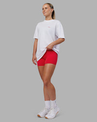 Woman wearing Dare To Think FLXCotton Tee Oversize - White-Scarlet | Model:Neve | Size:XS