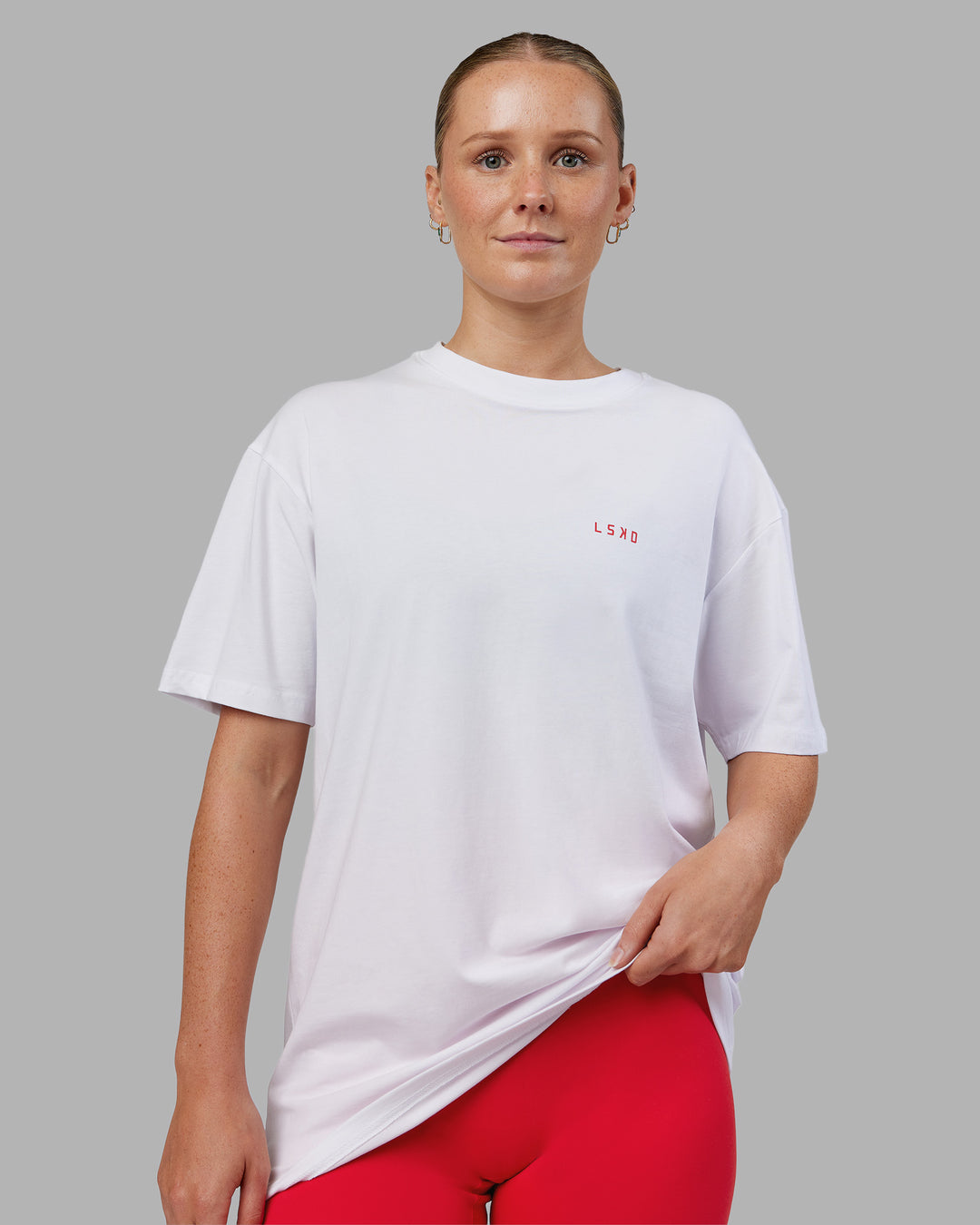 Woman wearing Dare To Think FLXCotton Tee Oversize - White-Scarlet | Model:Neve | Size:XS