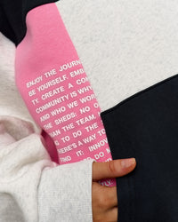 Woman wearing Deconstructed Fleece Hoodie - Caviar-Candy Pink-Grey Marl | Model:Leilani | Size:XS