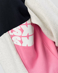 Woman wearing Deconstructed Fleece Hoodie - Caviar-Candy Pink-Grey Marl | Model:Leilani | Size:XS