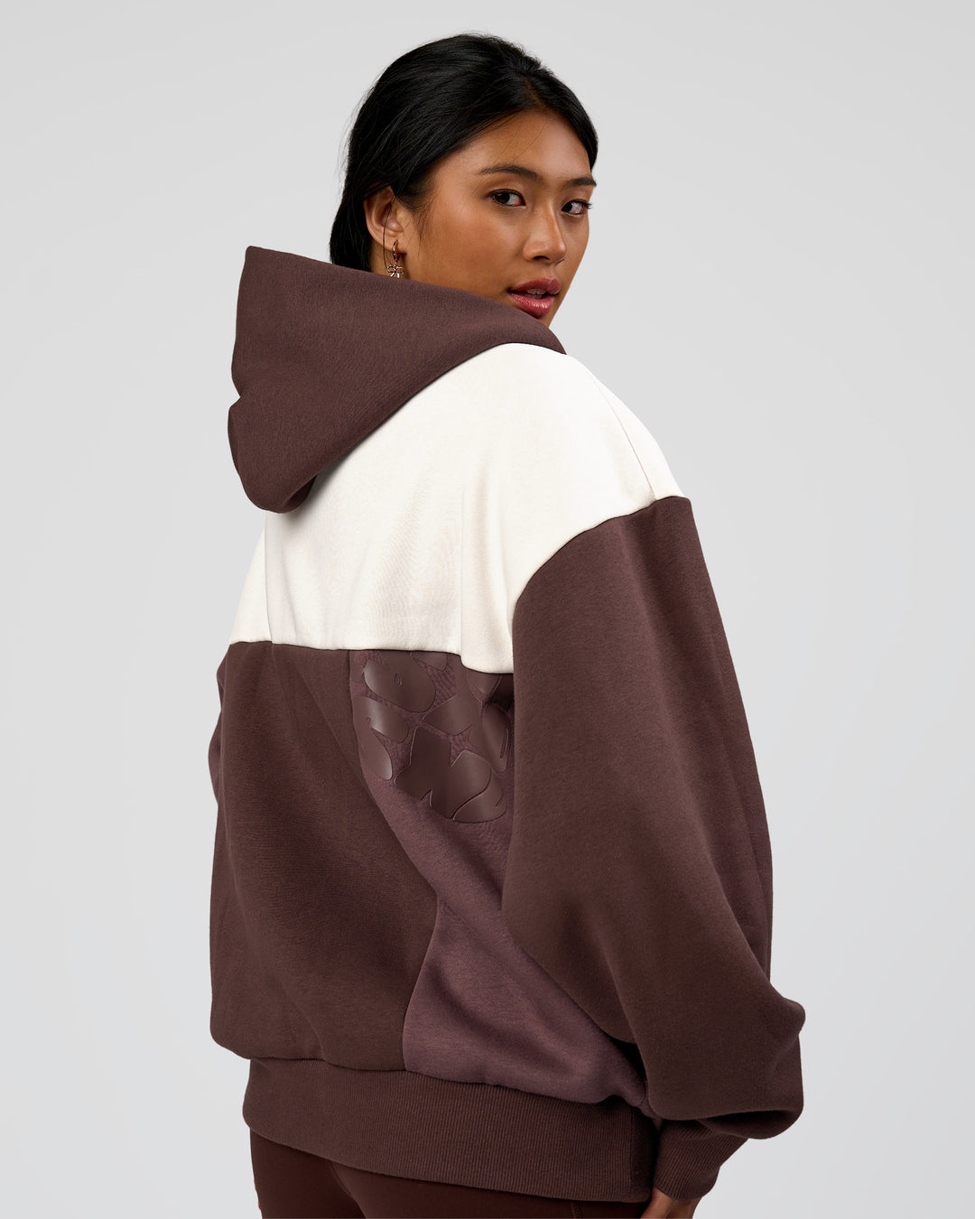 Woman wearing Deconstructed Fleece Hoodie - Off White-Cocoa Powder-Choc | Model:Loren | Size:XS