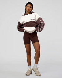 Woman wearing Deconstructed Fleece Hoodie - Off White-Cocoa Powder-Choc | Model:Loren | Size:XS