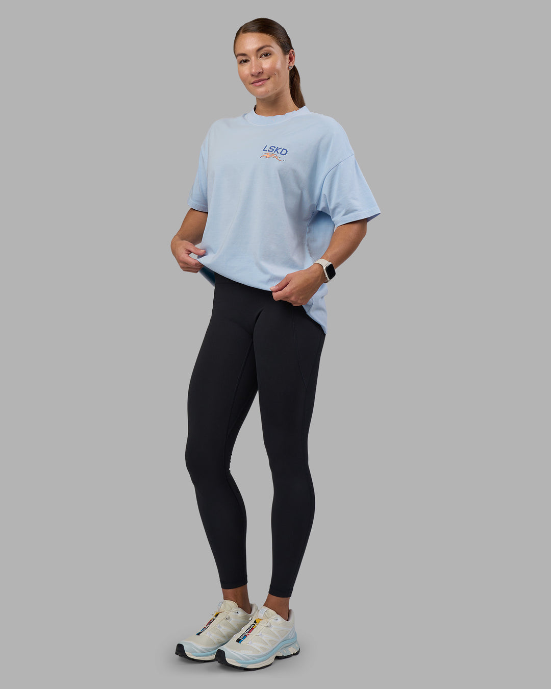 Woman wearing Digital World Heavyweight Oversized Tee - Open Air-Cantaloupe | Model:Hannah | Size:XS