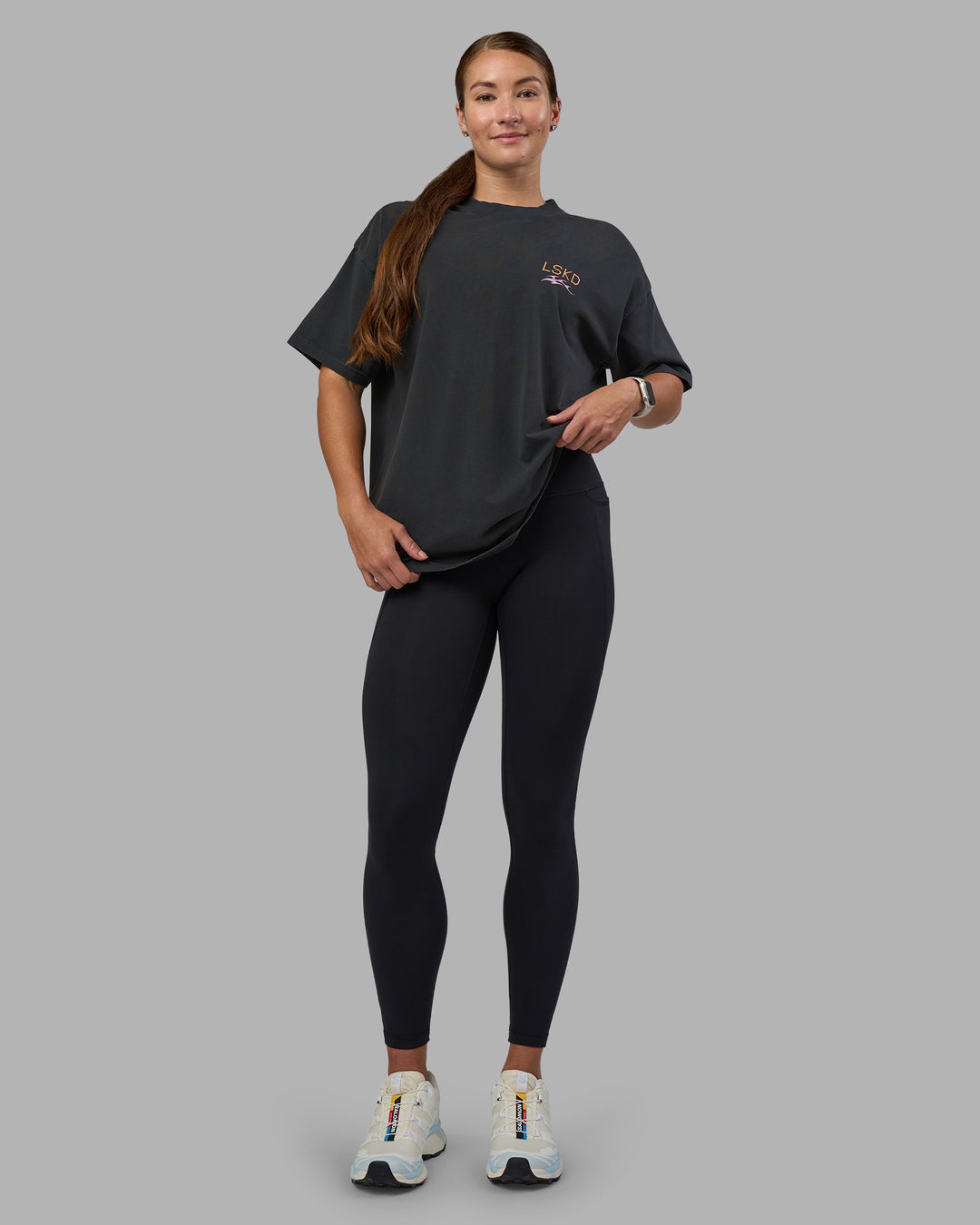 Woman wearing Digital World Heavyweight Oversized Tee - Washed Black | Model:Hannah | Size:XS