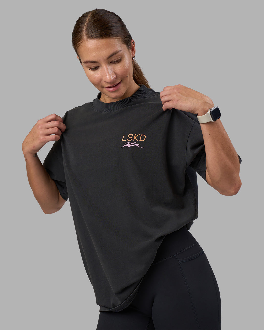 Woman wearing Digital World Heavyweight Oversized Tee - Washed Black | Model:Hannah | Size:XS