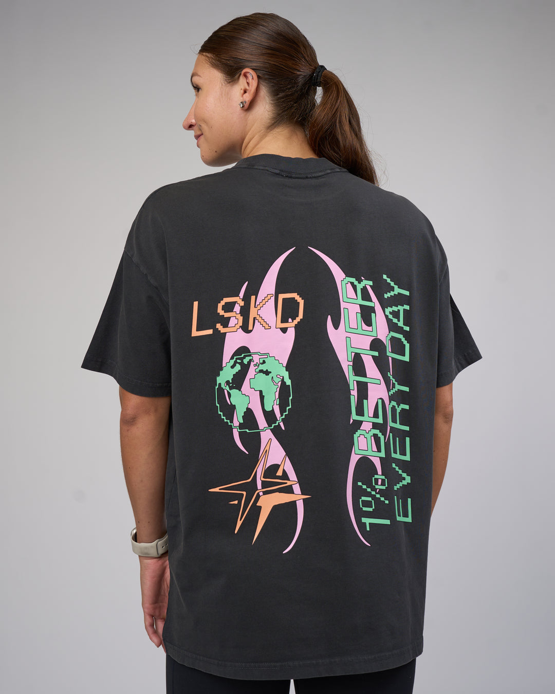 Woman wearing Digital World Heavyweight Oversized Tee - Washed Black | Model:Hannah | Size:XS