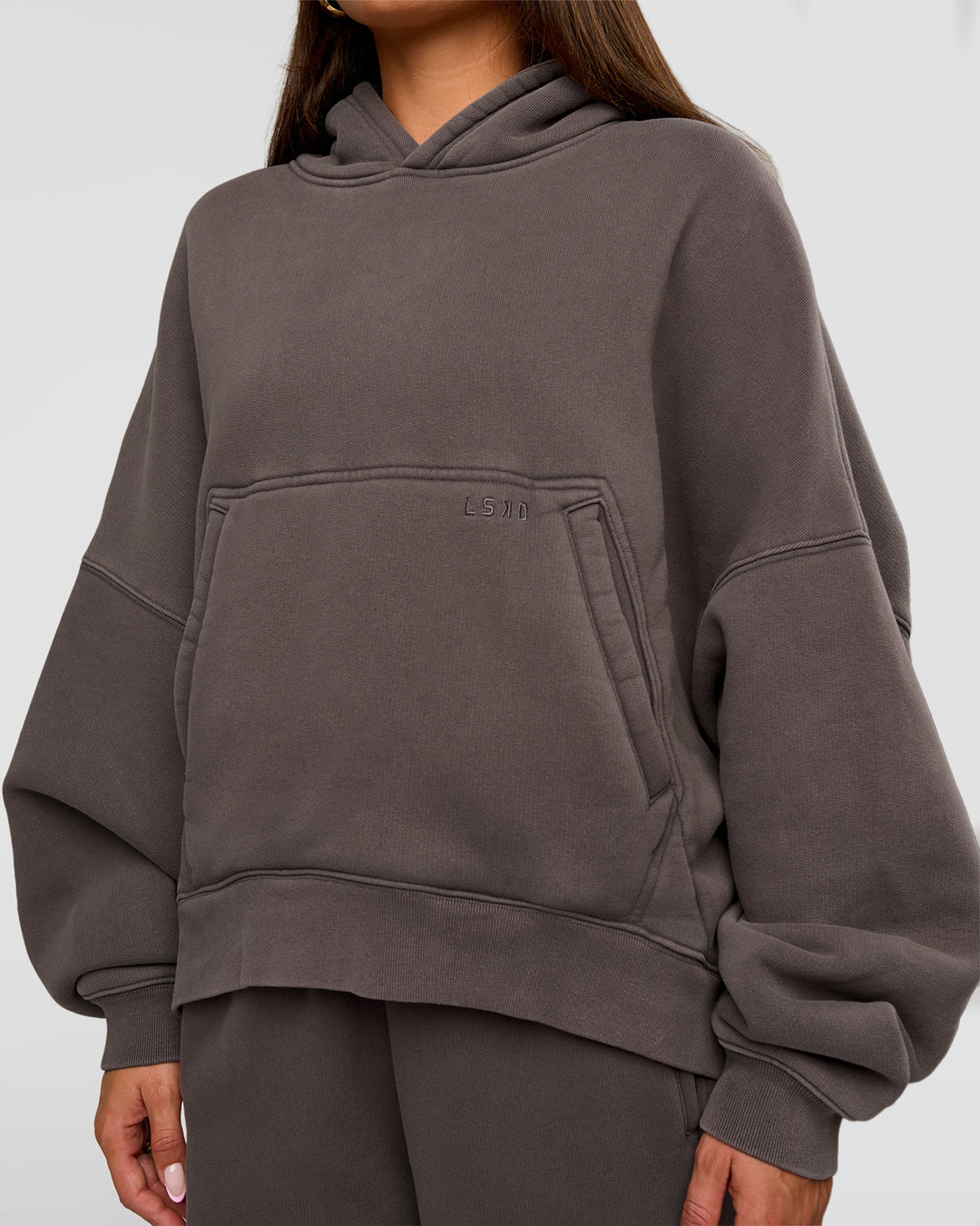 Woman wearing Distort Oversized Hoodie - Duskstone Washed | Model:Bianca | Size:XS