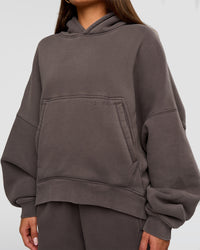 Woman wearing Distort Oversized Hoodie - Duskstone Washed | Model:Bianca | Size:XS