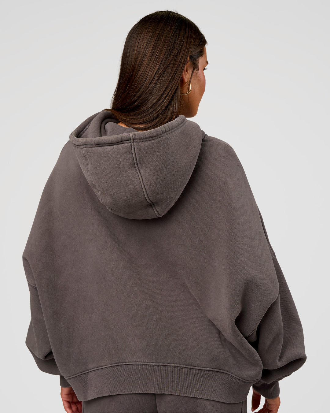 Woman wearing Distort Oversized Hoodie - Duskstone Washed | Model:Bianca | Size:XS