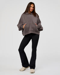 Woman wearing Distort Oversized Hoodie - Duskstone Washed | Model:Bianca | Size:XS