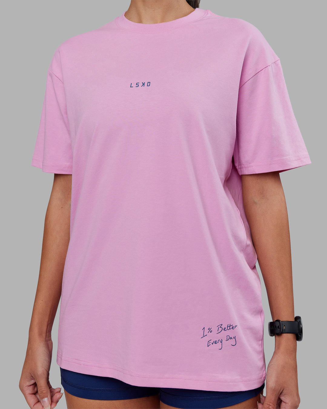 Woman wearing ETJ Values FLXCotton Oversize Tee - Bubblegum-Indigo | Model:Rhiley | Size:XS