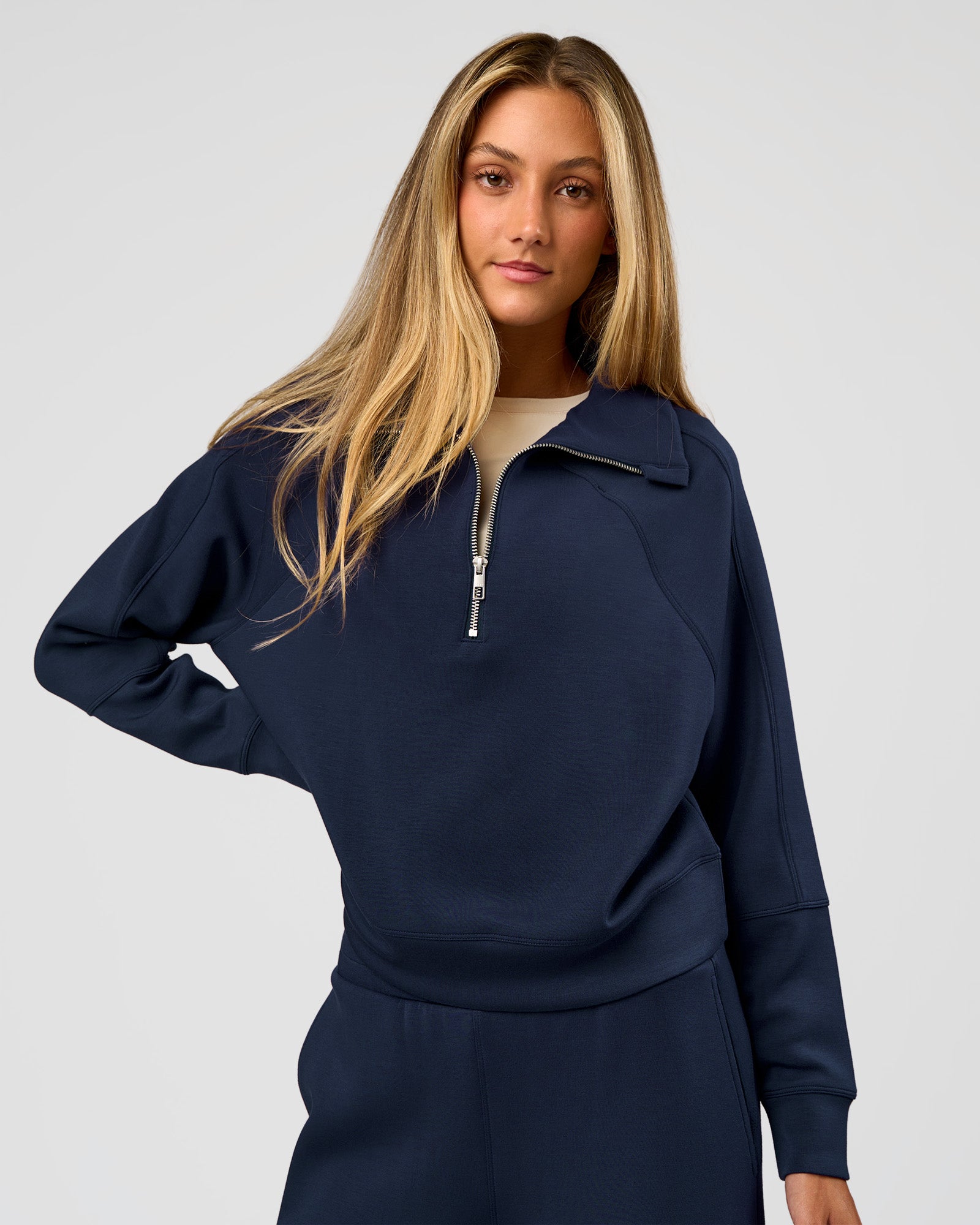 Woman wearing Elevate SoftTouch 1/2 Zip Sweater - Future Navy | Model:Georgia | Size:XS