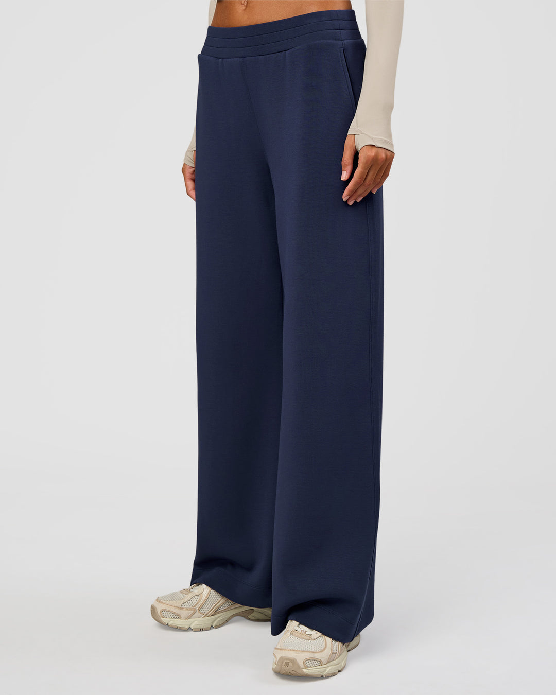 Woman wearing Elevate SoftTouch Wide Leg Pant - Future Navy | Model:Georgia | Size:XS