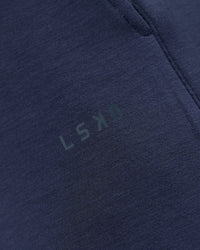 Woman wearing Elevate SoftTouch Wide Leg Pant - Future Navy | Model:Georgia | Size:XS