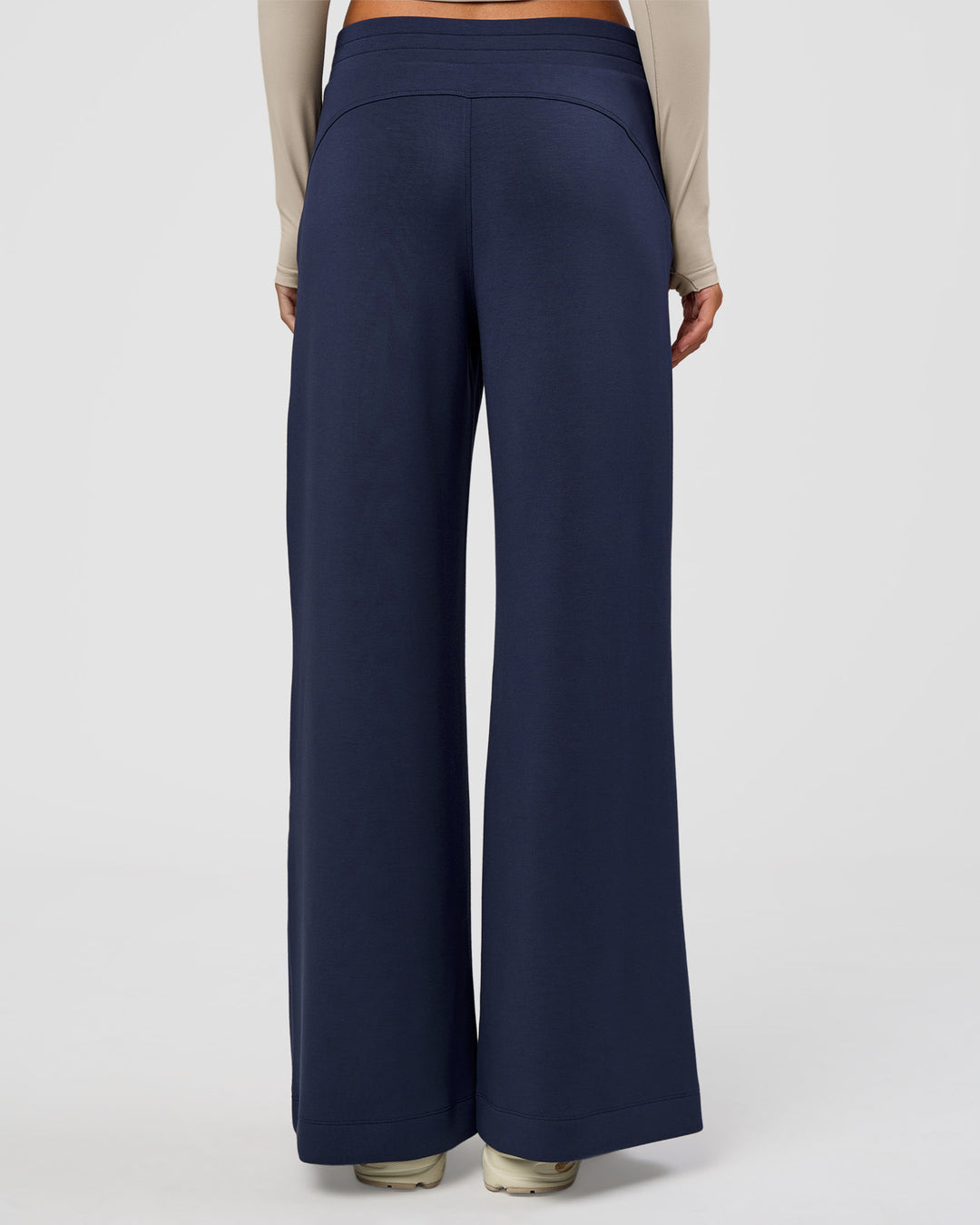 Woman wearing Elevate SoftTouch Wide Leg Pant - Future Navy | Model:Georgia | Size:XS