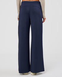 Woman wearing Elevate SoftTouch Wide Leg Pant - Future Navy | Model:Georgia | Size:XS