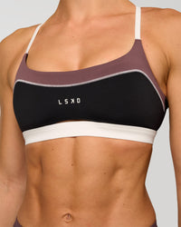 Man wearing Elevate Sports Bra - Black-Multi | Model:Maja | Size:XS