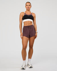 Woman wearing Elevated Accelerate Sports Bra - Black-Multi | Model:Maja | Size:XS