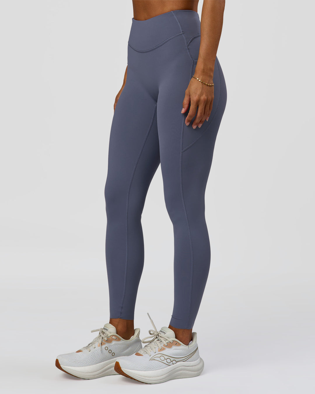 Woman wearing Elite Run High-Rise Full Length Legging Pockets - Night Shadow | Model:Brylee | Size:XS