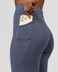 Woman wearing Elite Run High-Rise Full Length Legging Pockets - Night Shadow | Model:Brylee | Size:XS