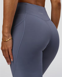 Woman wearing Elite Run High-Rise Full Length Legging Pockets - Night Shadow | Model:Brylee | Size:XS
