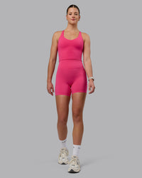 Woman wearing Elixir Ultra High-Rise 6" Short - Pink Flash