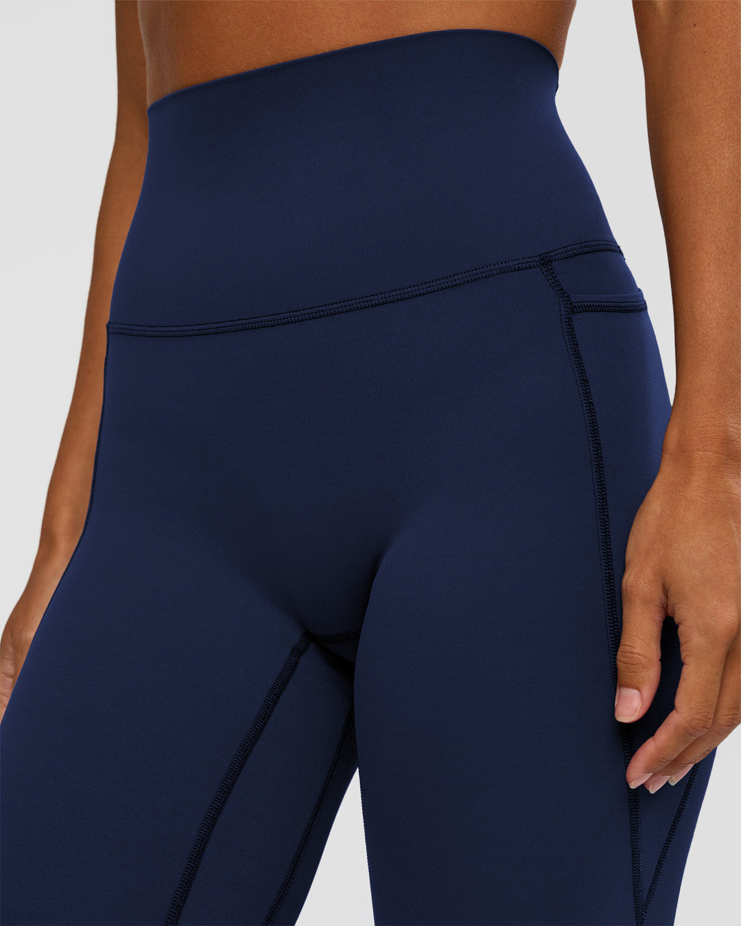 Woman wearing Elixir Ultra High-Rise Full Length Legging Pockets - Future Navy | Model:Brylee | Size:XS