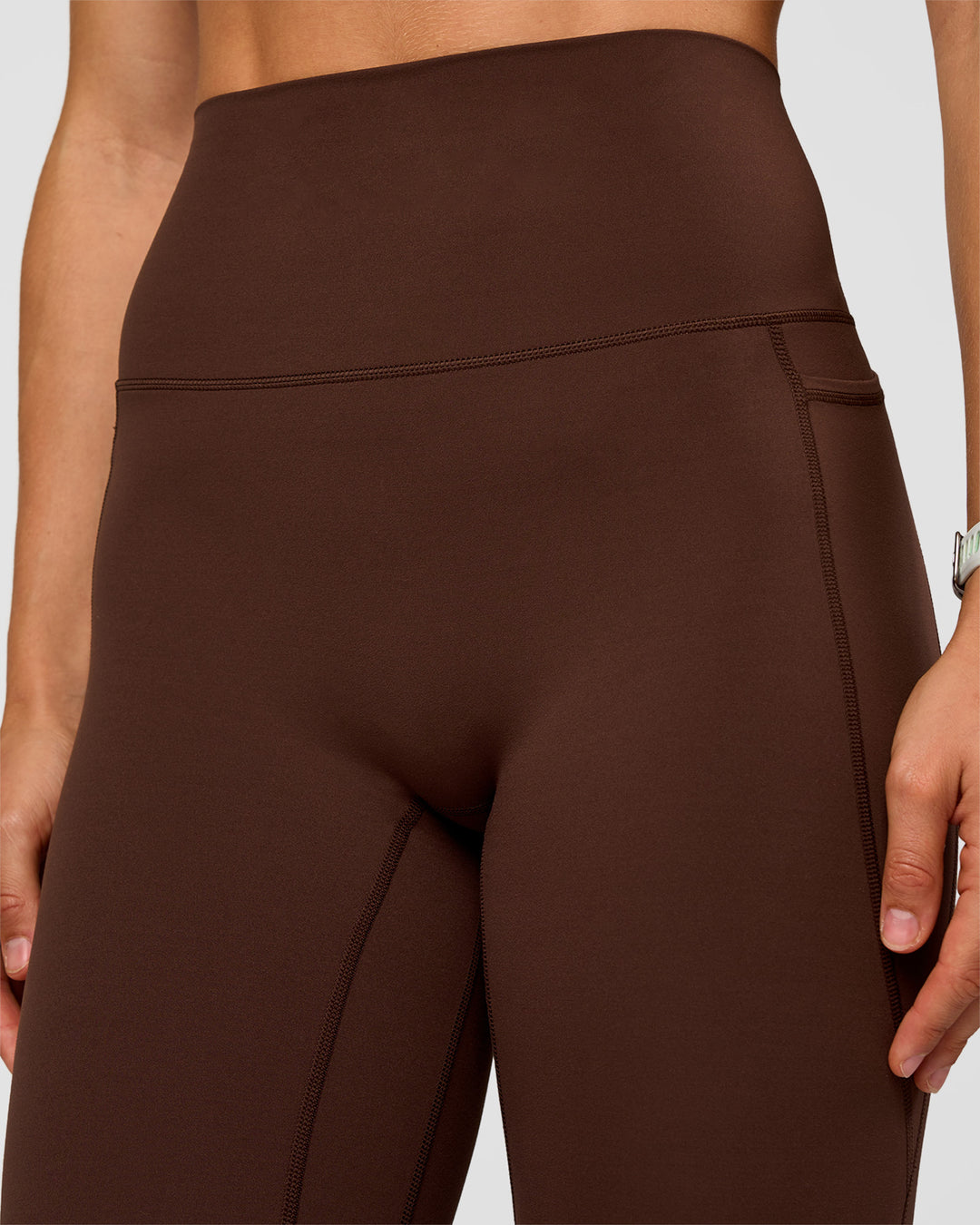Woman wearing Elixir Ultra High-Rise Full Length Legging Pockets - Hot Chocolate | Model:Maja | Size:XS