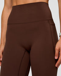 Woman wearing Elixir Ultra High-Rise Full Length Legging Pockets - Hot Chocolate | Model:Maja | Size:XS