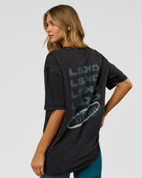 Woman wearing Everyday Elevation FLXCotton Oversized Tee - Black Washed-Carbon Green | Model:Leilani | Size:XS