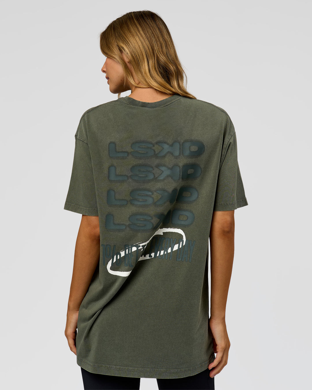 Woman wearing Everyday Elevation FLXCotton Oversized Tee - Carbon Green Washed -White | Model:Leilai | Size:XS