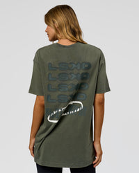 Woman wearing Everyday Elevation FLXCotton Oversized Tee - Carbon Green Washed -White | Model:Leilai | Size:XS