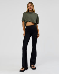 Woman wearing Everyday Elevation FLXCotton Oversized Tee - Carbon Green Washed -White | Model:Leilai | Size:XS