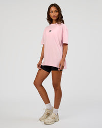 Woman wearing Everyday Elevation FLXCotton Oversized Tee - Marshmallow-Black | Model:Dakota | Size:XS
