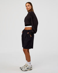 Woman wearing Everyday Elevation Waffle Oversized Sweater - Black | Model:Brylee | Size:XS