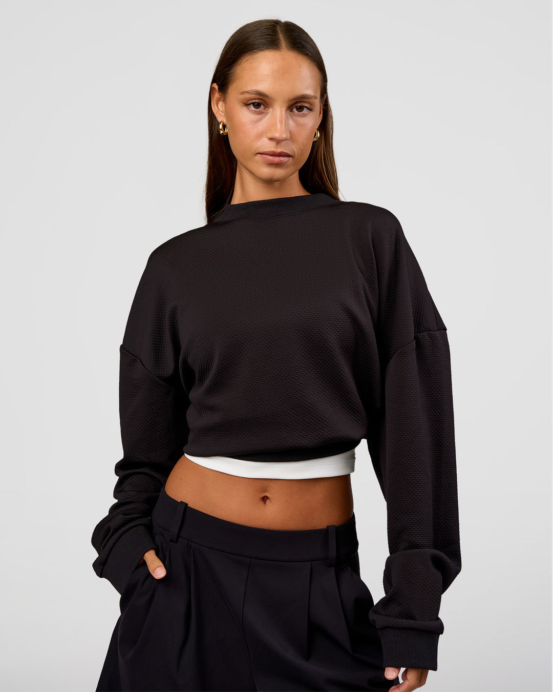 Woman wearing Everyday Elevation Waffle Oversized Sweater - Black | Model:Brylee | Size:XS