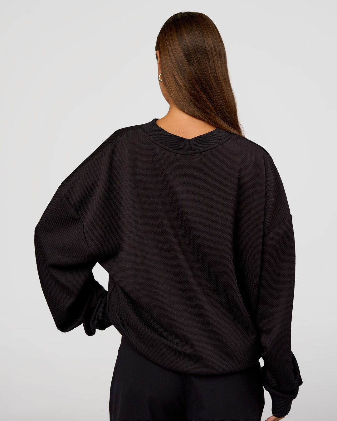 Woman wearing Everyday Elevation Waffle Oversized Sweater - Black | Model:Brylee | Size:XS