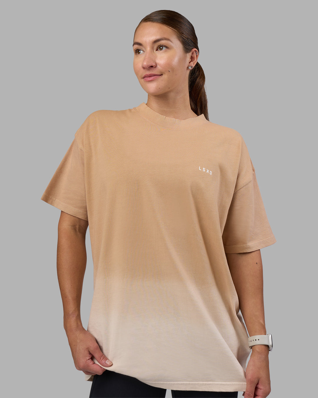 Woman wearing Faded Heavyweight Oversized Tee - Warm Smoke-White | Model:Hannah | Size:XS